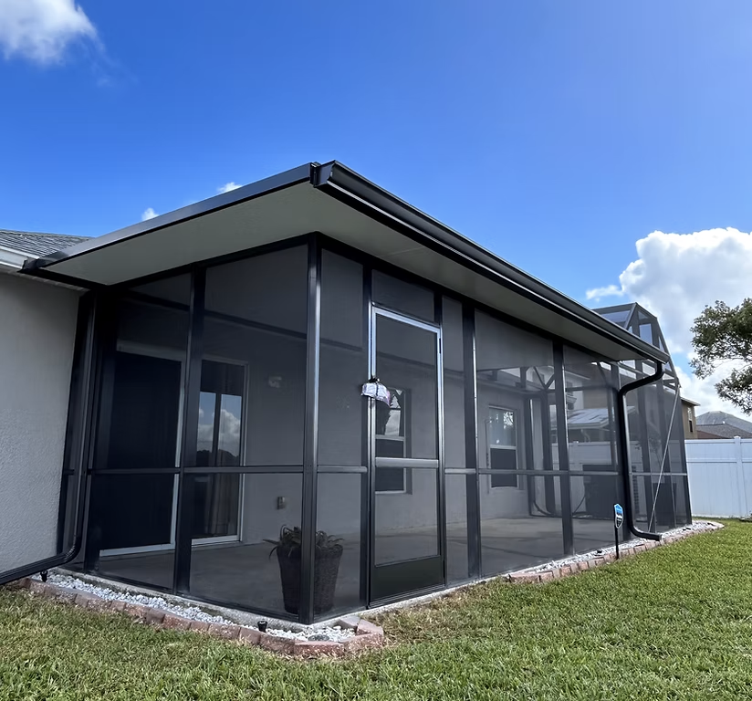 Lanai screen enclosure installation in Palm Bay, FL on residential home patio